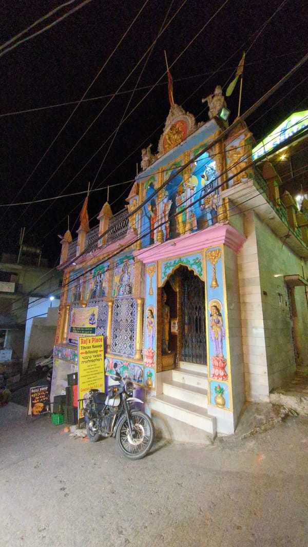 Colorfully lit building documented in Bhagsu, India