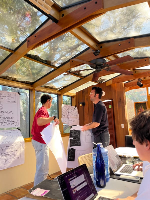 Three collaborate on project in Topanga sunroom workspace