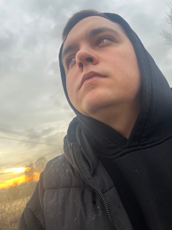 Person takes outdoor selfies in rural Russian village