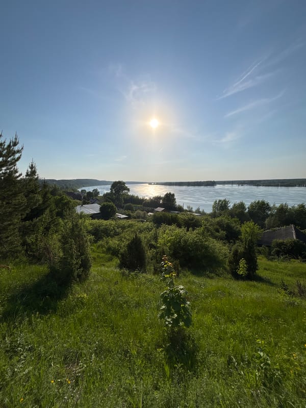 Afternoon riverside gathering documented in Ольховка, Russia
