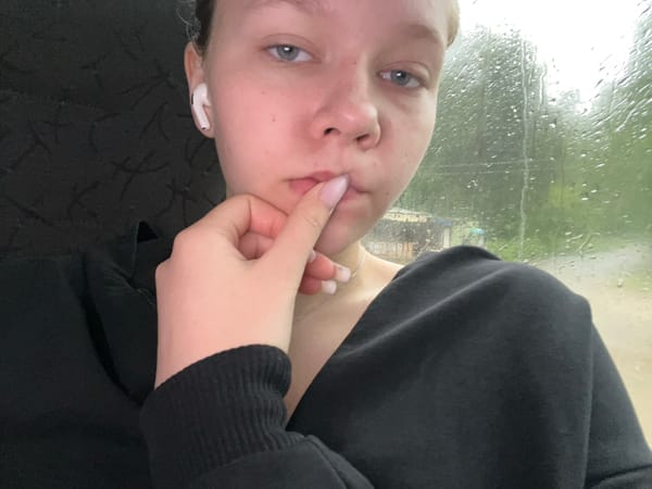 Close-up portrait with earbuds, Krasnokamsk, Russia