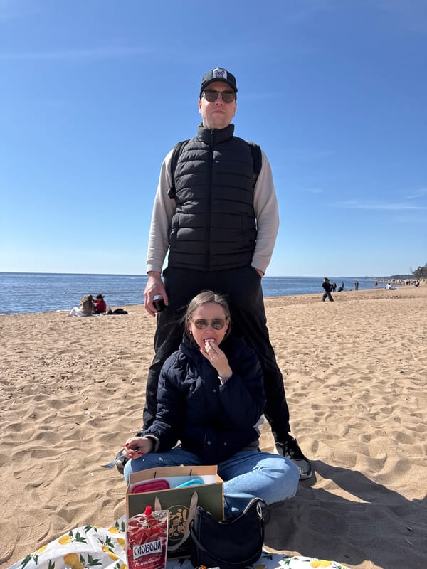 Couple enjoys beach picnic in Zelenogorsk, Russia