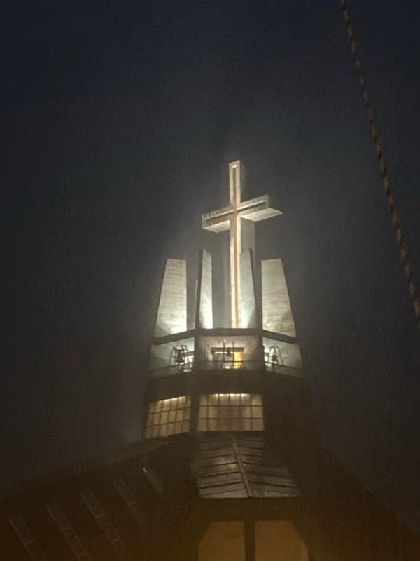 Stormy night at a modern illuminated church in Świdnica