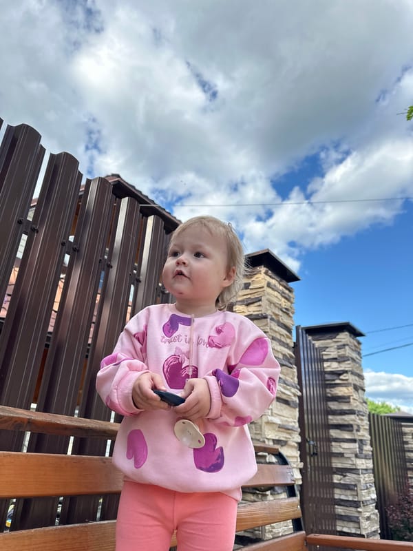 Toddler photographed playing outdoors in Nizhny Novgorod park