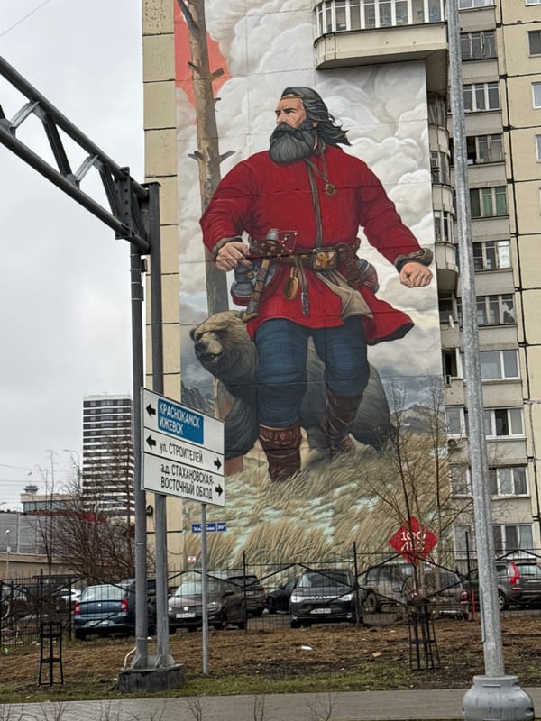 Bear-riding mural and street gathering documented in Perm, Russia
