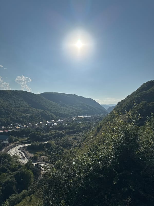 Sunny valley views over a village in Khuchni, Dagestan