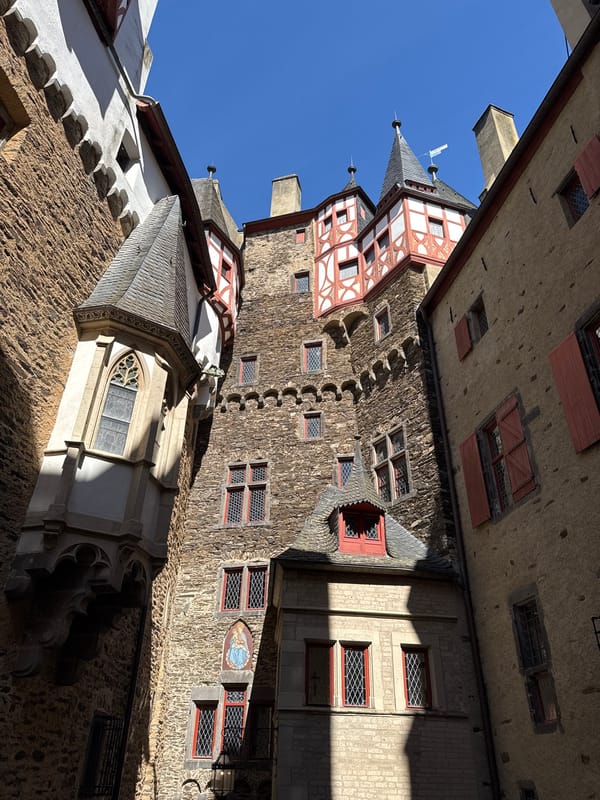 Tourist captures medieval architecture at Burg Eltz castle