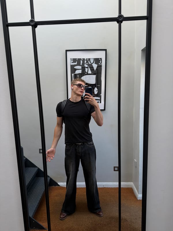 Mirror selfies in a London room, early morning