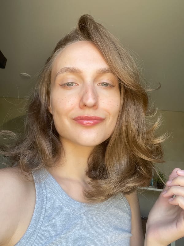 Woman takes selfies in Podshivalovo, Russia bathroom