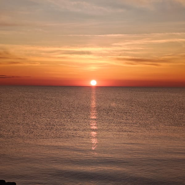 Sunset observed over sea near Shcholkino, Ukraine