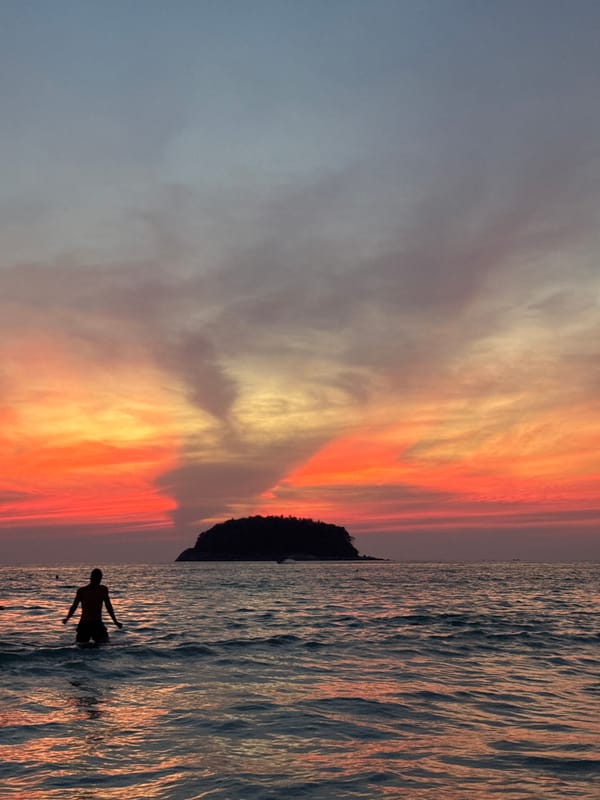Sunset beach football draws crowds at Karon, Thailand