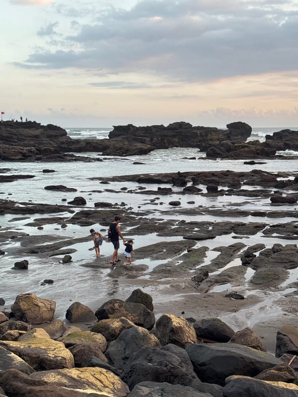 Peaceful rocky coastline documented in Mengwi, Indonesia