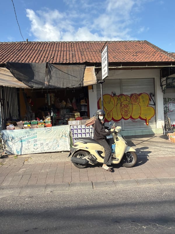 Morning motorcycle traffic observed in North Kuta streets