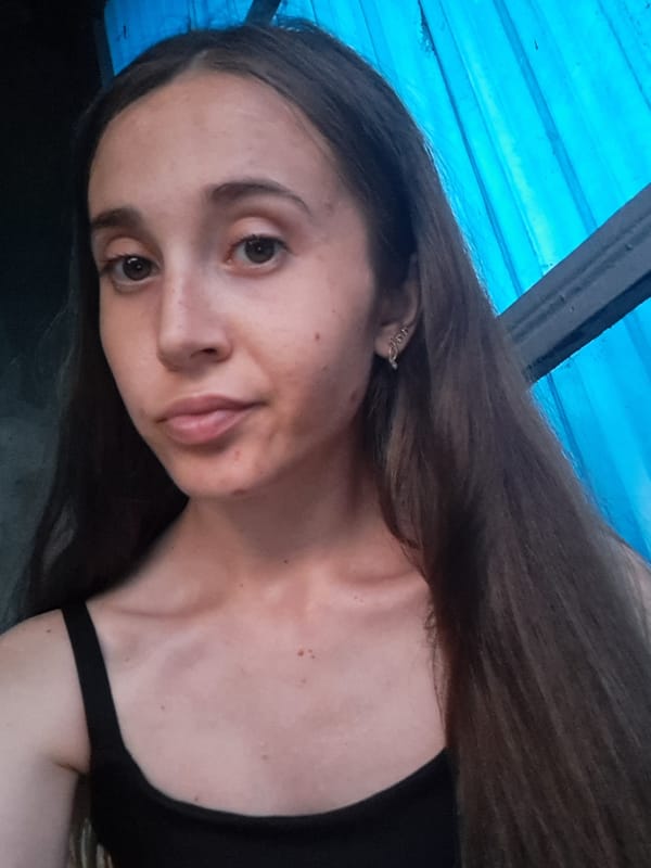 Afternoon into evening in Vypasne, selfies and backyard cats.