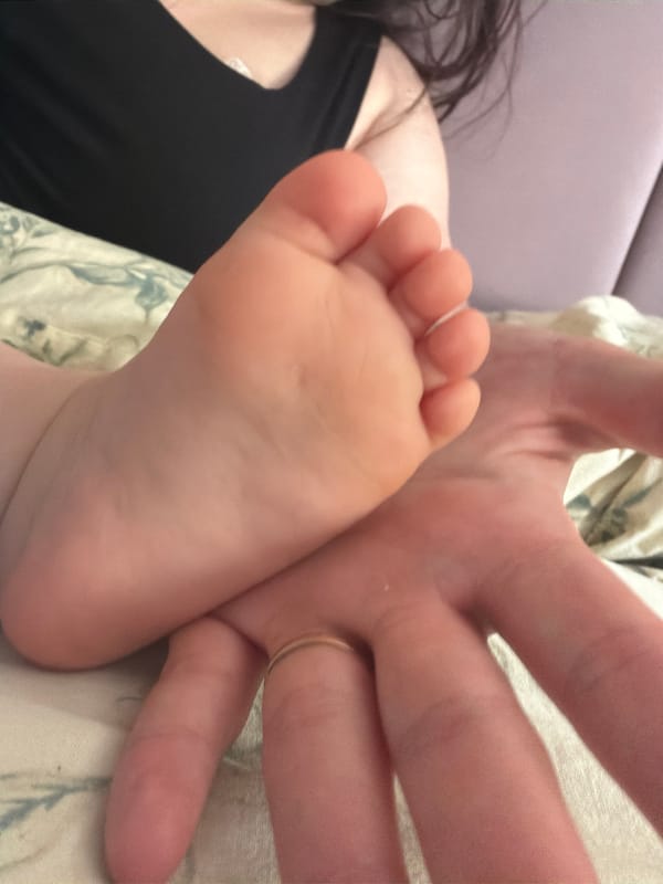 Adult with baby captured in intimate moment in Staraya