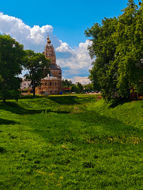 Woman documents architectural tour including Russian churches and public spaces