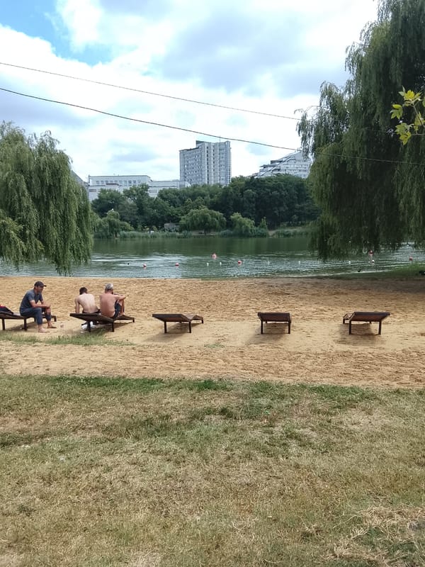 Summer day at a Chișinău recreational park, courts and lakeside active