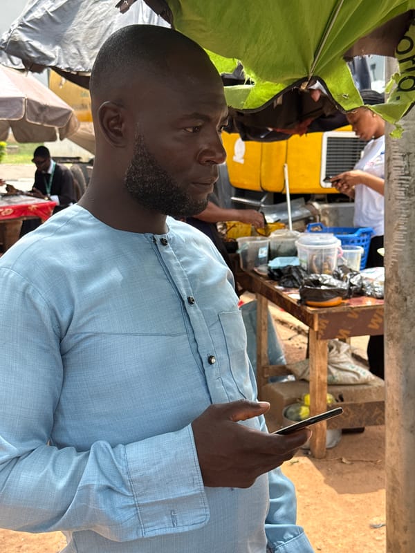 Daily life unfolds across Abuja markets and streets