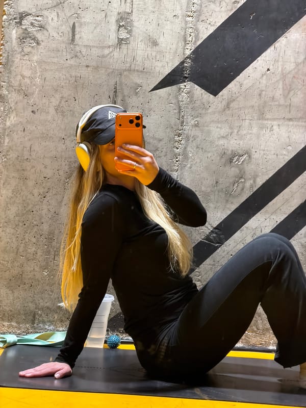 Woman exercises on mat at Tel-Aviv fitness facility