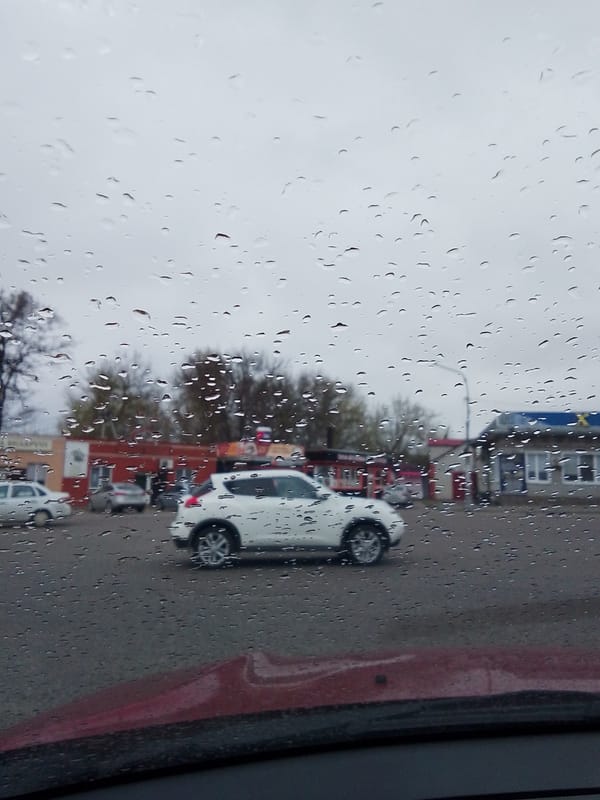Morning rain creates wet driving conditions in Khlevnoye, Russia