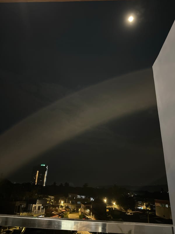 Witness documents nighttime Davao City views from high-rise balcony