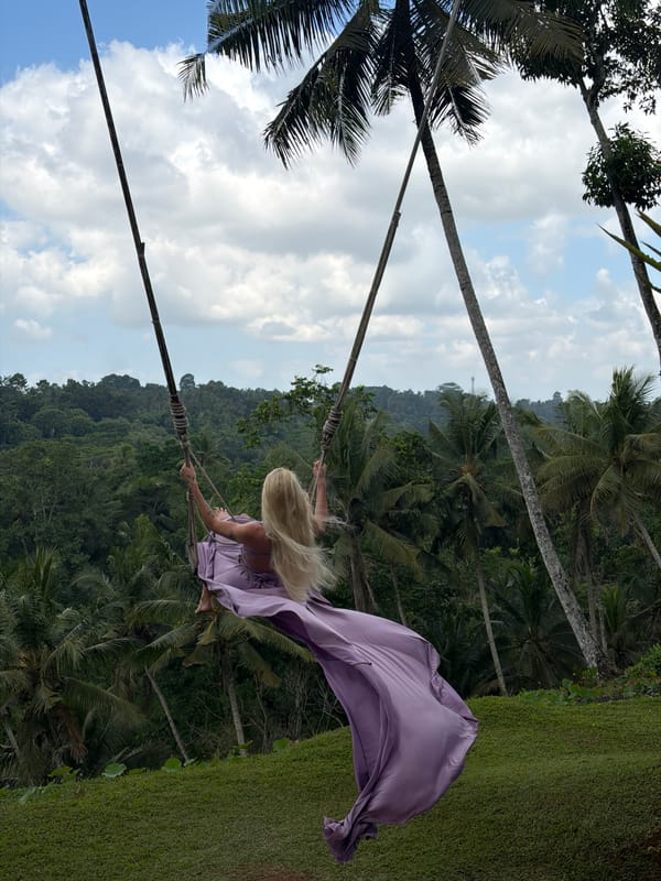 Woman enjoys swing and selfies at Indonesia resort