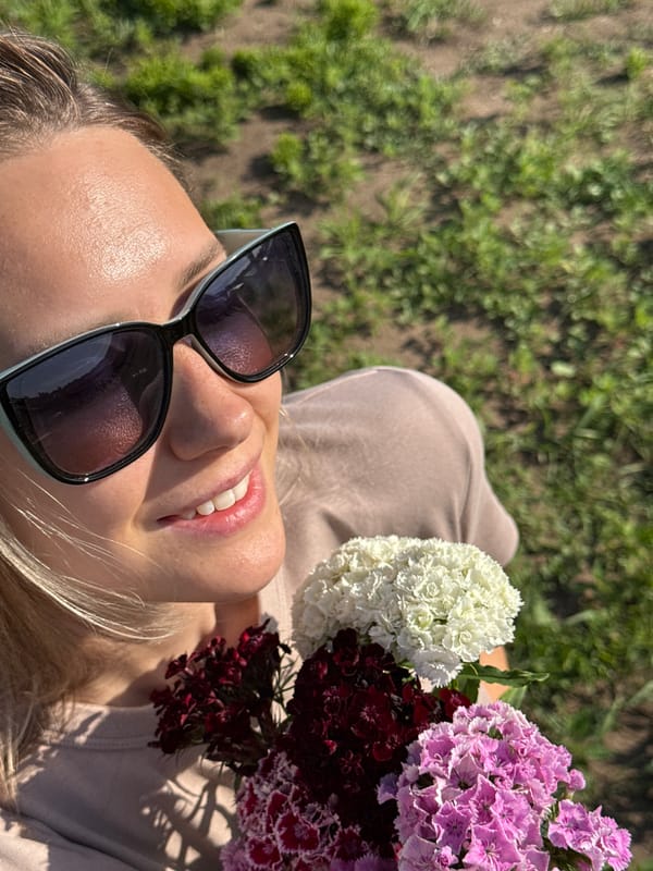 Relaxing in the grass with a bouquet in Chaikovsky