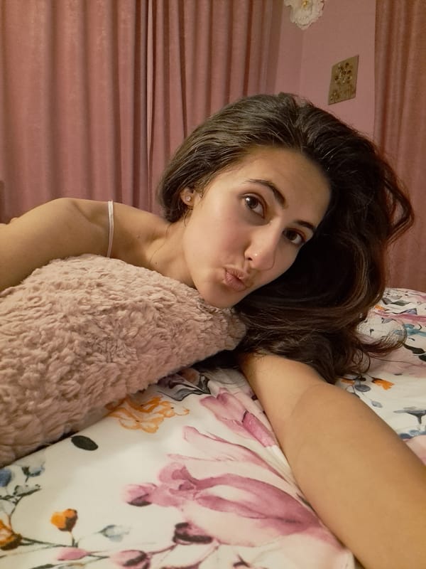 Woman photographed in bedroom in Chepintsi, Bulgaria