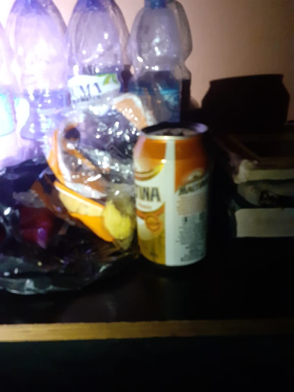 Everyday objects and clutter inside a Jalingo room