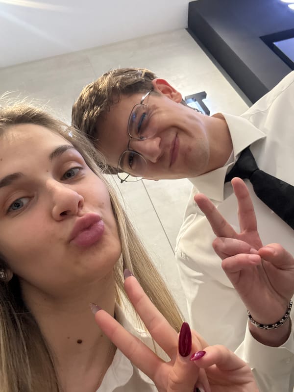 Two people pose for indoor selfie in Sofia