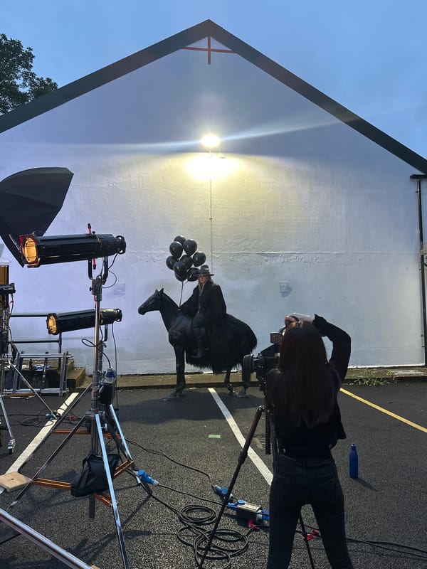 Outdoor photoshoot with horse prop filmed in London parking lot