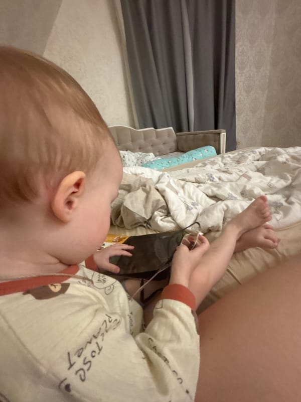 Mother and baby share quiet moments in Russian home