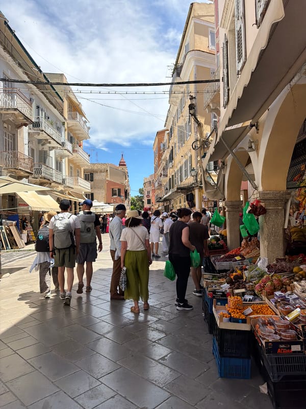 Tourist captures sunny morning scenes across historic Corfu streets