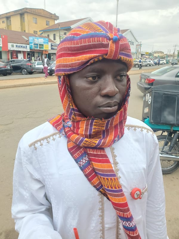 Person in traditional dress spotted on Jos street