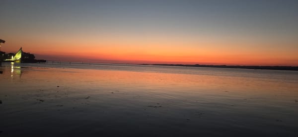 Sunset over Lake Constance, Bregenz — gazebo lights on the water