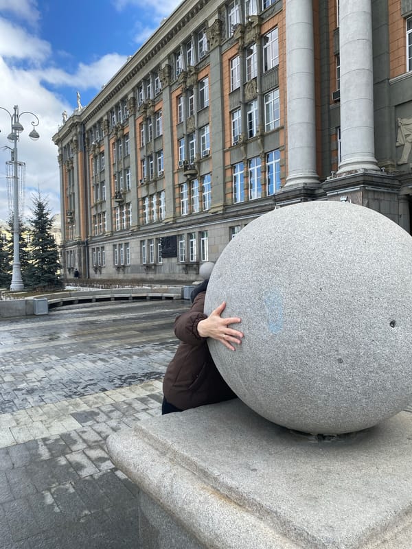 Tourist documents morning walk through central Yekaterinburg landmarks