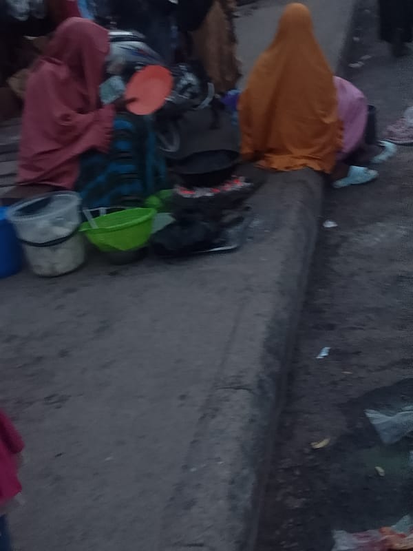 Daily street life documented across Pantame, Nigeria during afternoon hours