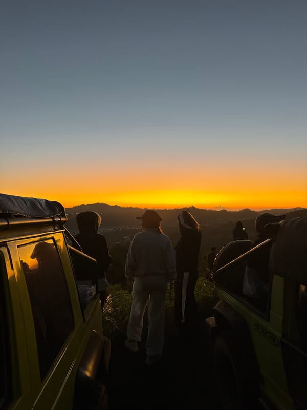 Jeep rooftop sunset watching at Kintamani's volcanic viewpoint