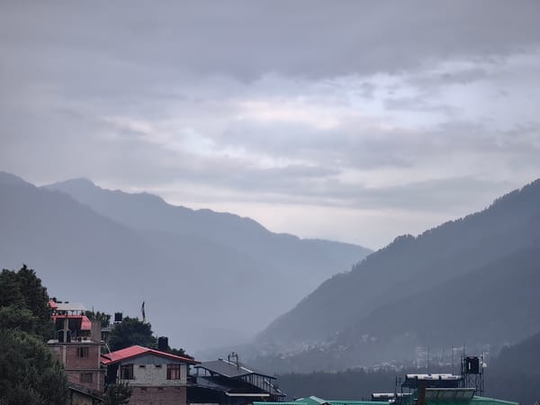 Misty mountain valley views documented in Vashisht, India