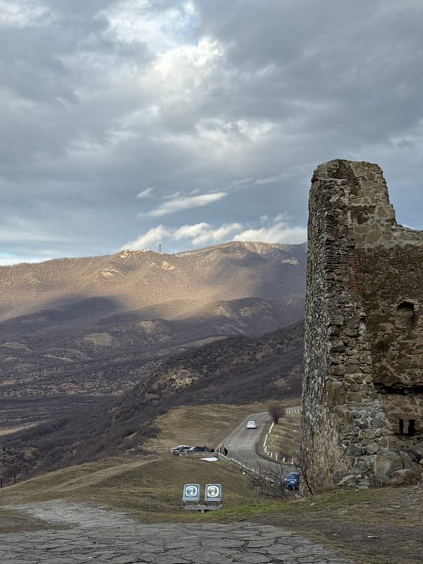 Tourists visit historic Jvari Monastery in Mtskheta, Georgia