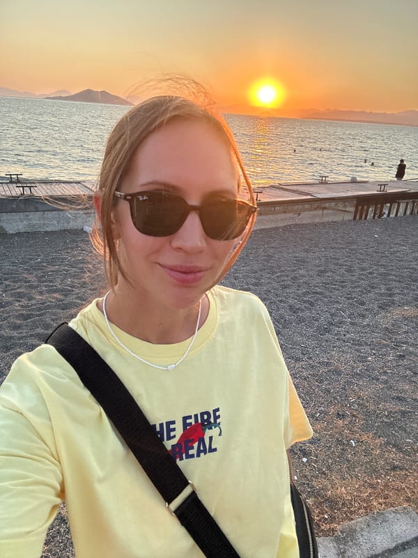 Golden hour on a busy Fethiye pebble beach