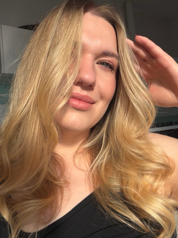 Woman photographed smiling indoors in Dreiliņi, Latvia