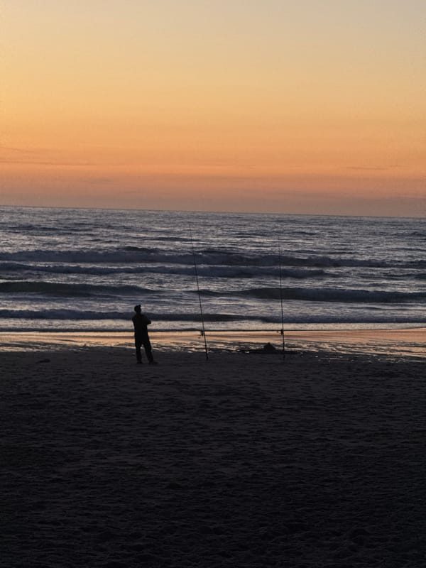 Sunset fishing scene captured on Bidart beach, France