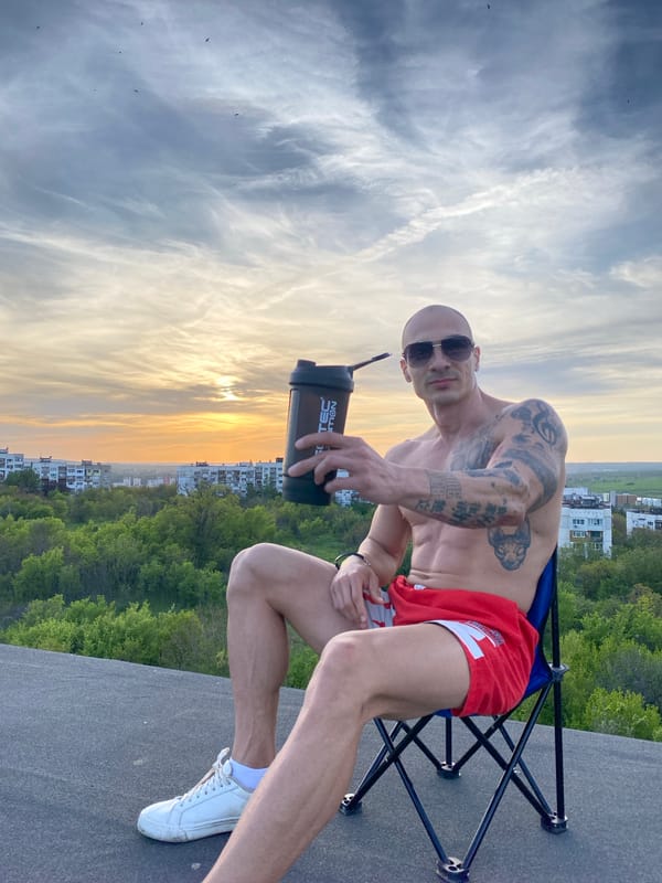 Tattooed man poses for rooftop photoshoot in Pleven