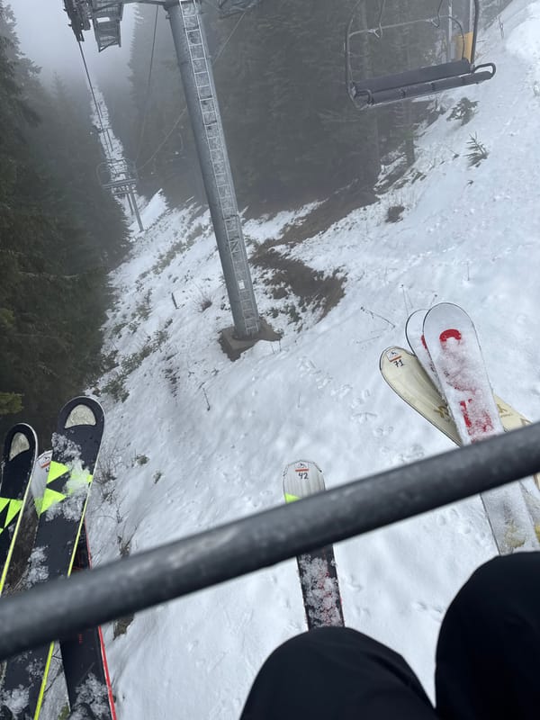 Morning ski lift ride captured in snowy Borovets, Bulgaria