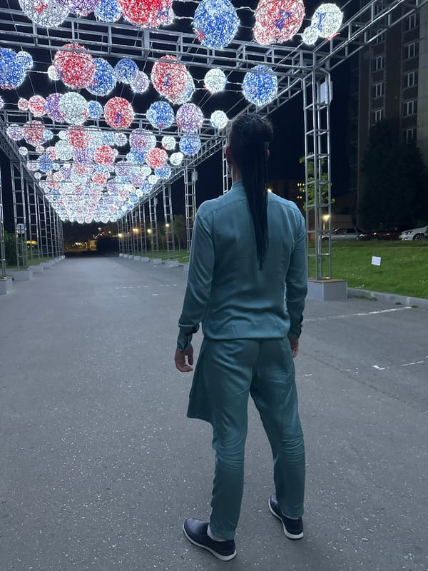 Evening stroll along a festively lit walkway in Saratov