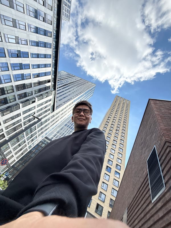 Low-angle selfies at a modern Moscow plaza