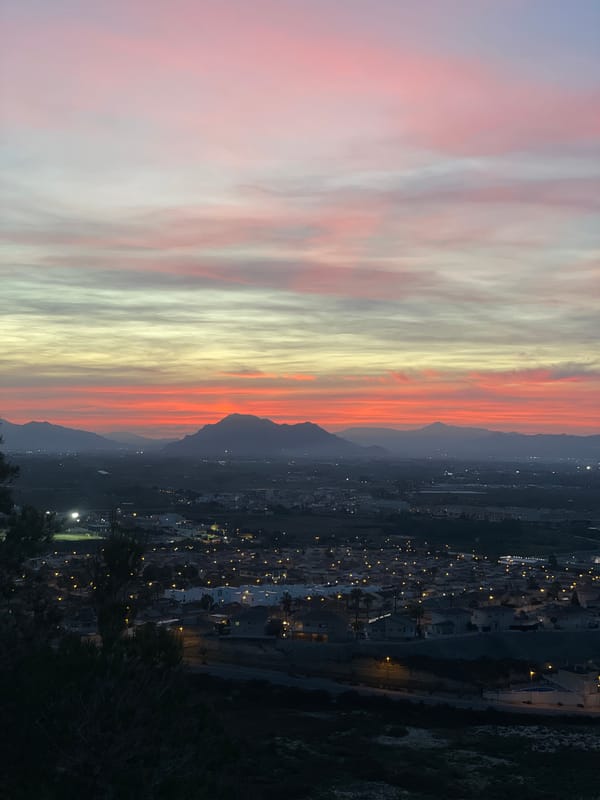 Colorful twilight sunset observed over Rojales, Spain mountains