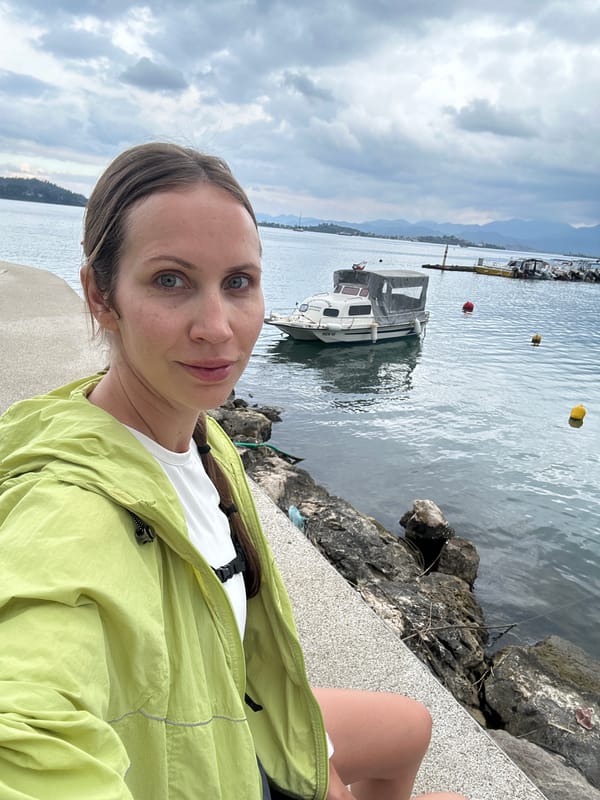 Woman exercises at Turkish marina under cloudy morning skies