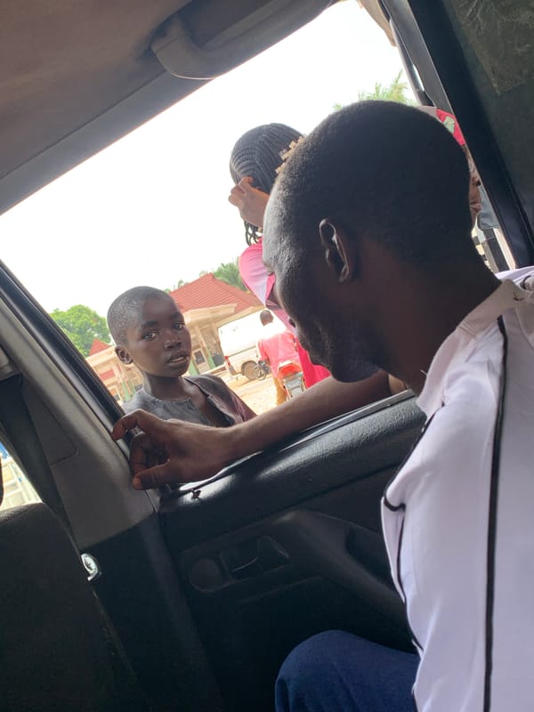 Brief interaction captured between man and boy in Akwanga